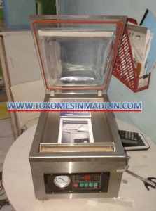 mesin pengemas produk sistem vacuum