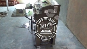 paket mesin perajang dan pengemas sistem vacuum otomatis